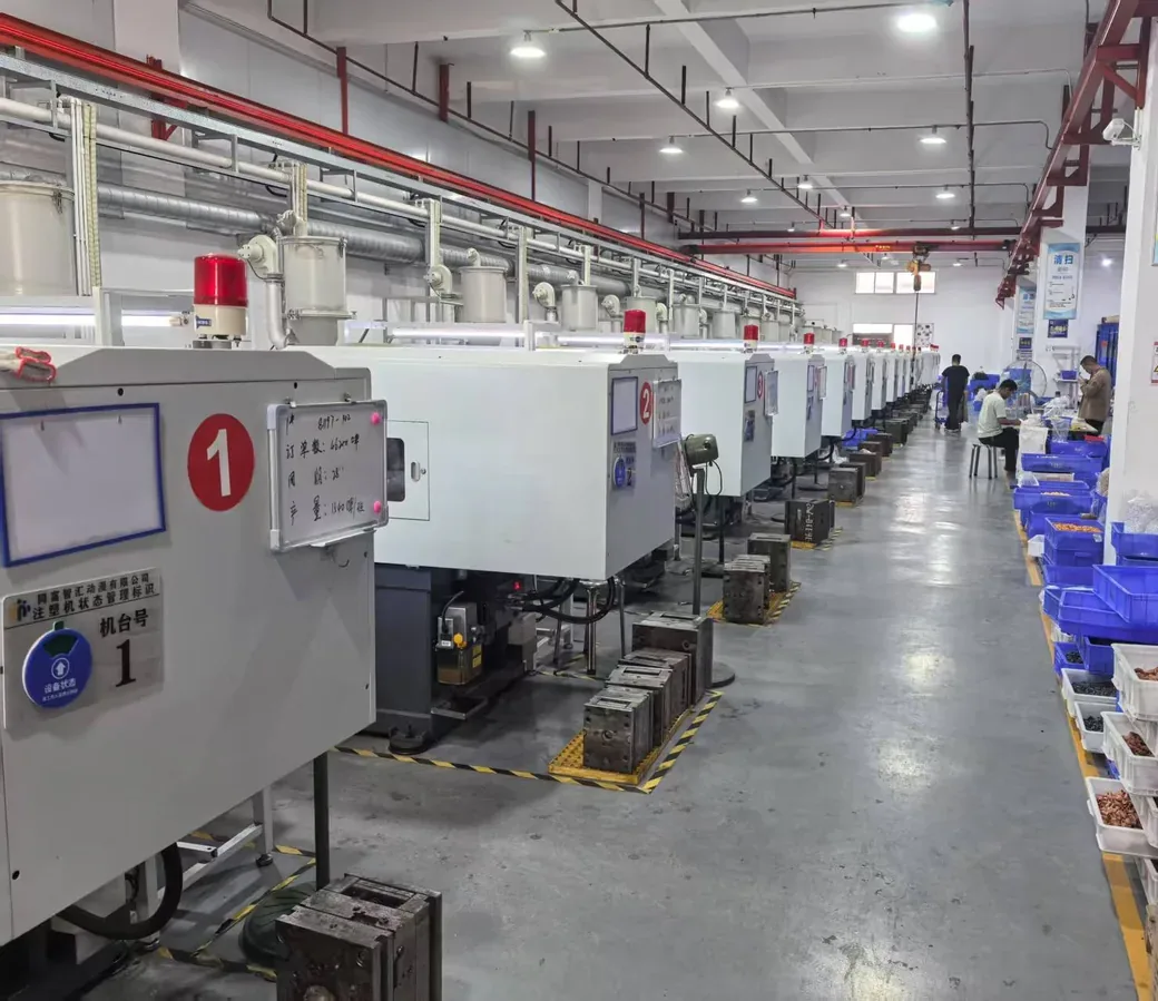 Injection molding workshop — line of CNC injection machines